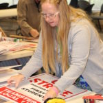Teamsters at First Student Put Together Picket Signs for Possible Strike